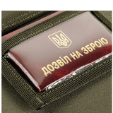 Close-up af M-Tac Pung med Patch Panel Elite Gen. II, viser robust materiale og visitkort med ukrainsk skrift.