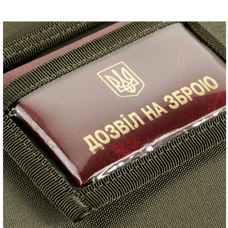 Close-up af M-Tac Pung med Patch Panel Elite Gen. II, viser robust materiale og visitkort med ukrainsk skrift.