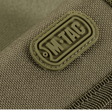 Nærbillede af M-Tac Pung med Patch Panel Elite Gen. II lavet af slidstærkt Oxford og Cordura 500D materiale.