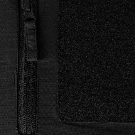 Detalje af lynlås og forstærkning på M-Tac Alpha Gen.III Pro Vinterjakke for ekstra holdbarhed og komfort.