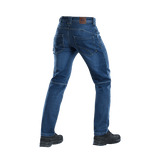 Bagside af M-Tac Jeans Tactical Gen. I Cordura Regular Fit, holdbare Cordura denimbukser til dagligt og taktisk brug, vist med støvler.