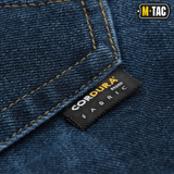 Nærbillede af M-Tac Jeans Tactical Gen. I Cordura Regular Fit med holdbart Cordura Denim stof.