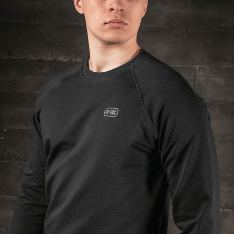 M-Tac Raglan Athlete sweatshirt, sort farve, minimalistisk design, raglanærmer, komfortabel pasform, perfekt til sport og hverdag.
