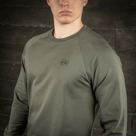 M-Tac Raglan Athlete sweatshirt i oliven med raglanærmer og rund hals. Ideel til sport og hverdagsbrug, materiale: bomuld og elastan.