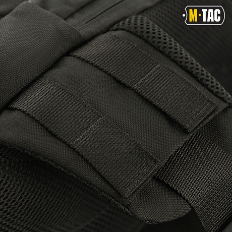 M-Tac Buckler Taske Elite med MOLLE-system i sort Cordura 500D, tæt visning af design og stropper.