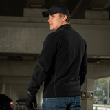 Mand iført M-Tac Nord Polartec Fleecejakke i sort, perfekt til hverdagsbrug og sport, set bagfra. Polartec® 200 Series fleece.
