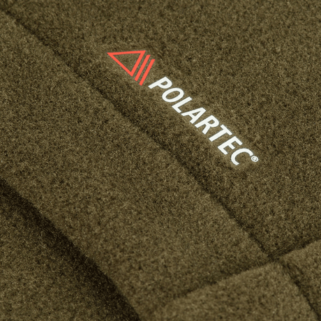 Nærbillede af M-Tac Nord Polartec Fleecejakke med Polartec® logo. Premium varmeisolering og fugtstyring til hverdagsbrug.