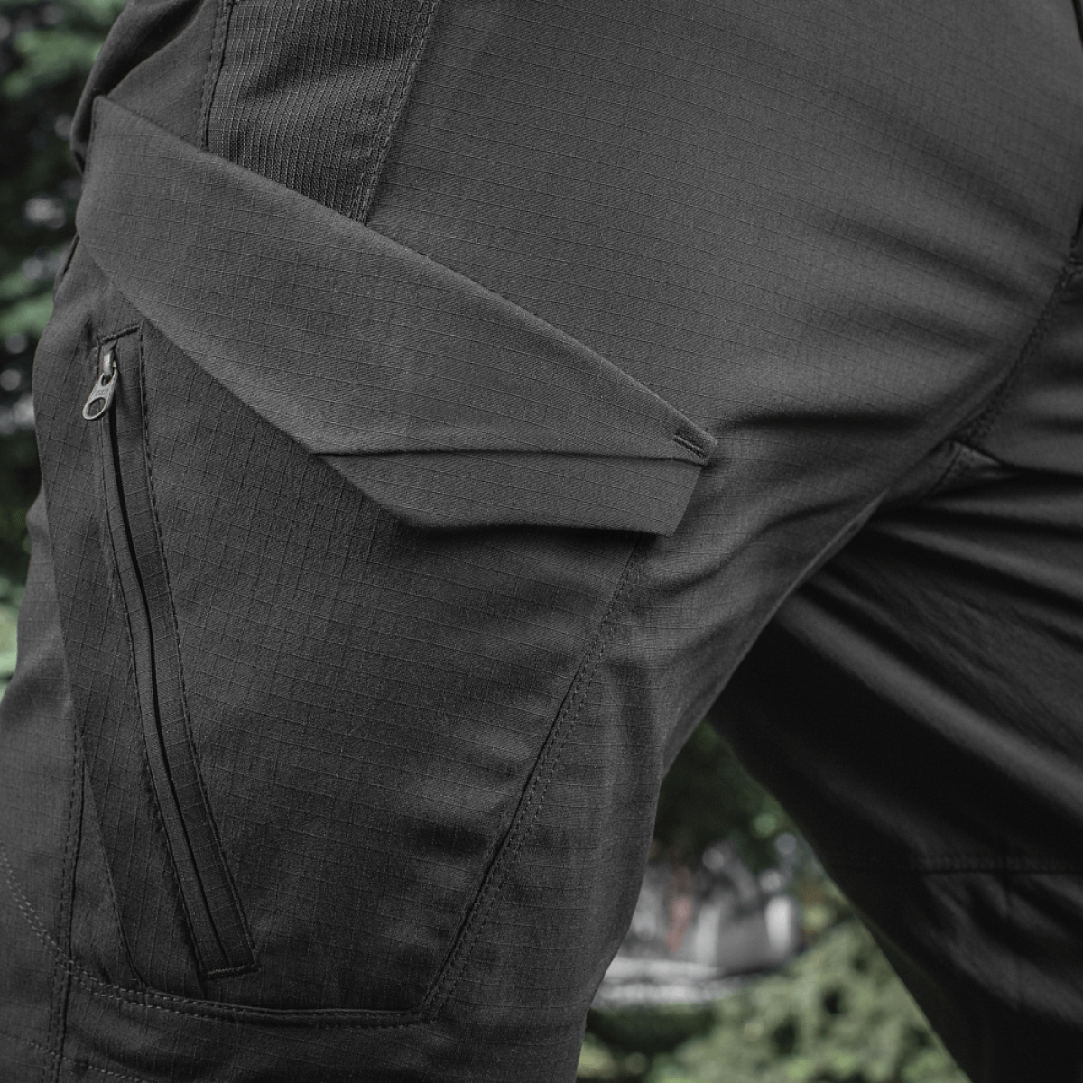 M-Tac Aggressor Summer Flex Shorts med Rip-Stop stoffet, syv lommer og justerbar talje, perfekt til taktisk brug og udendørsaktiviteter.