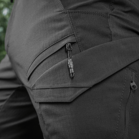 Nærbillede af M-Tac Aggressor Summer Flex Shorts med lommedesign og Flex Rip-Stop stof, perfekt til taktisk brug og høj solresistens.