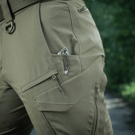 M-Tac Aggressor Summer Flex Shorts i letvægts Flex Rip-Stop stof, med funktionelle lommer og D-ringe, til udendørs aktiviteter.