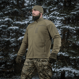 M-Tac Combat Fleece Polartec Jakke til taktisk brug i vintermiljø, med avanceret design og funktionelle materialer.