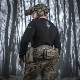 M-Tac Raglan Odin Mystery trøje med Odin-motiv, set bagfra i skovmiljø.