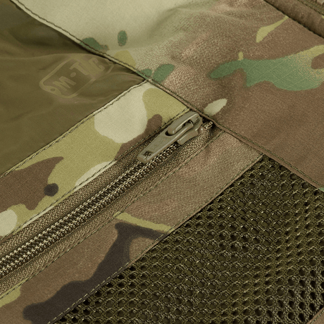 M-Tac Alpha Gen.IV Pro Primaloft Vinterjakke i Multicam med holdbar lynlås og vandafvisende materiale til ekstreme temperaturer.