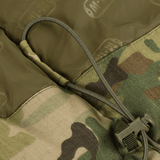 Detalje af M-Tac Alpha Gen.IV Pro Primaloft Vinterjakke med Multicam mønster og snoretræk til justering.