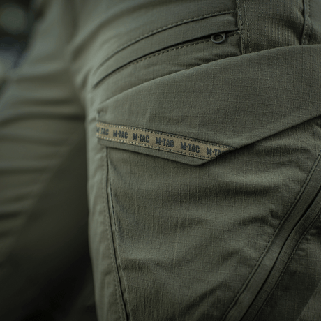 M-Tac Bukser Aggressor Summer Flex Dame i Rip-Stop nylonstof med YKK-lukninger, viser detalje af taktiske bukser til kvinder