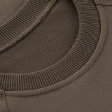 Nærbillede af M-Tac Raglan Logo krave, visende den behagelige pasform og materiale af 95% bomuld og 5% elastan.