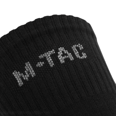 Nærbillede af M-Tac Sokker Mk.1, designet til komfort og støtte under lange gåture og aktiviteter.