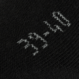 Nærbillede af M-Tac Sokker Winter Wool i sort uld med grå mærkning; ideelle til varme og komfort i den kolde sæson.