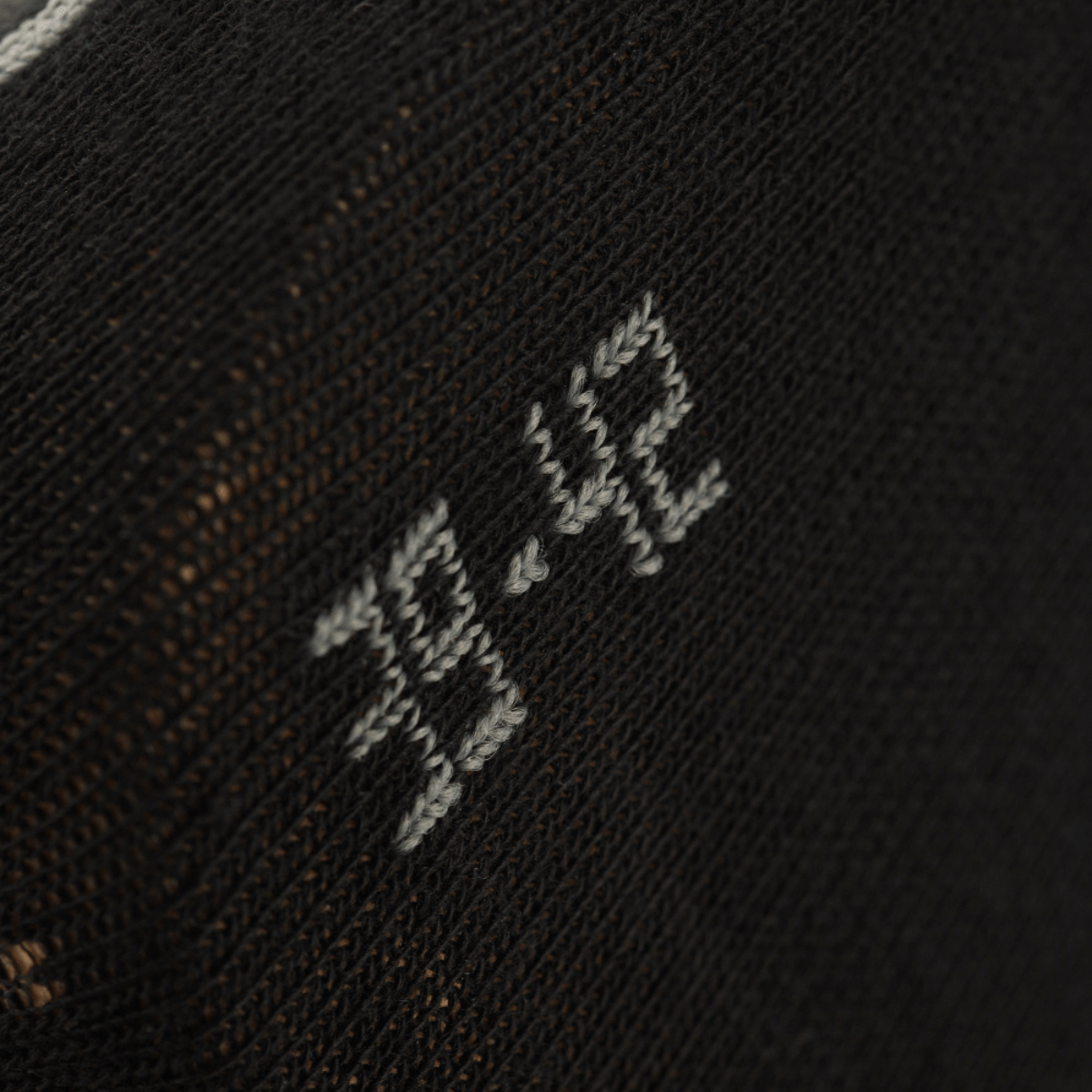 Nærbillede af M-Tac Letvægtssokker Mk.3 med størrelse 38-42, ideelle til trekking og daglig brug, lavet af åndbare materialer.