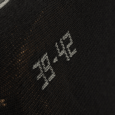 Nærbillede af M-Tac Letvægtssokker Mk.3 med størrelse 38-42, ideelle til trekking og daglig brug, lavet af åndbare materialer.