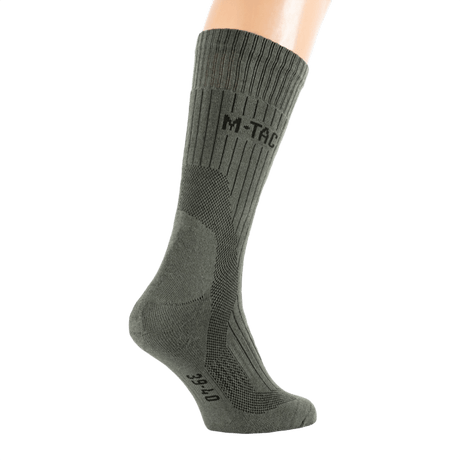 M-Tac Sokker Mid Calf Mk.4, komfortable trekkingstrømper til mænd, med polstrerede områder og thermozoner for optimal beskyttelse.