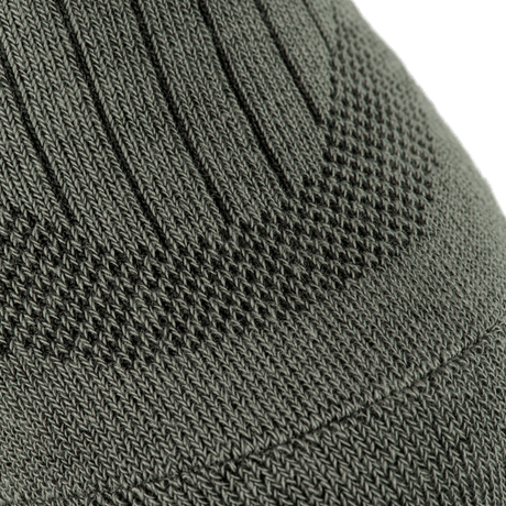 Detaljeret billede af M-Tac Sokker Mid Calf Mk.4 med specielt designet thermozoner og polstrede områder for optimal komfort og beskyttelse.