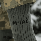 M-Tac Sokker Mid Calf Mk.4 med komfort og beskyttelse til trekking, med thermozoner og polstrede områder.