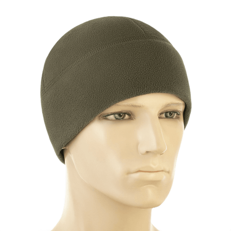 M-Tac Watch Cap Elite Fleece Beanie Hat Slimtex i olivengrøn på mannequin, varm og let til taktisk brug, friluftsliv eller vinteraktiviteter.
