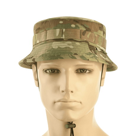 M-Tac Panama Hat Gen.II NYCO i camouflage på mannequin, komfortabel til sommer og holdbar, med MOLLE og ventilationshuller.