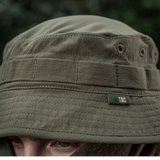 M-Tac Panamahat Gen. II Summer Flex i oliven, let og holdbar til varme sommerdage, beskytter mod solen med klasse seks solbeskyttelse.