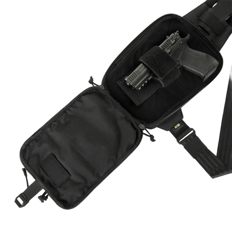 M-Tac Sling Pistol Taske Elite Hex med Velcro åbnet med pistol indeni, justerbar skulderrem og robust materiale.