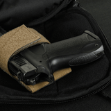 Indvendig visning af M-Tac Sphaera Hex Hardsling Bag Large Elite med en sort pistol.