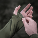 Detaljeret visning af ærmet på en M-Tac Polartec Sport Fleecejakke i grøn farve med tommelfingerhul.