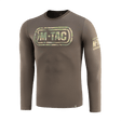 M-Tac T-Shirt Logo Long Sleeve i camouflage med ikonisk M-Tac-logo og slogan "Born by Revolution – Hardened by War" på ærmet.