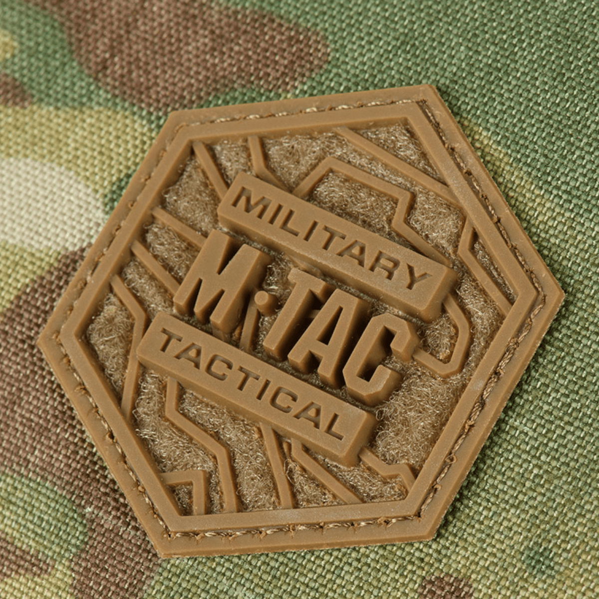Nærbillede af M-Tac Konvert Taske Elite med Cordura materiale og militær taktile detaljer.