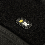 Nærbillede af M‑Tac Våbenetui 128 cm med M‑Tac logo, lavet af sort polyester til sikker transport og opbevaring af våben op til 128 cm.