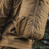 M-Tac Rygsæk Gen. II Elite – Small med mesh-lommer, MOLLE-paneler og elastiske snore for sikker pakning udendørs.