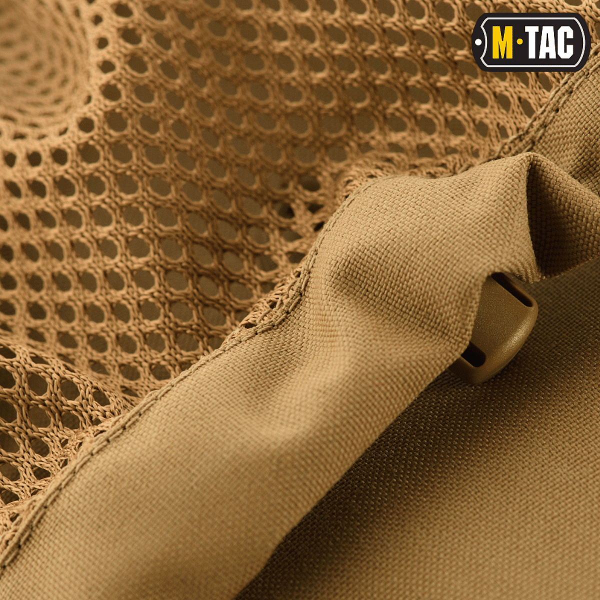 Meshlomme detalje på M-Tac Rygsæk Gen. II Elite – Small med elastisk snor for sikker opbevaring.