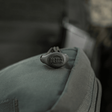 M-Tac organizer pouch Elite med robust design og MOLLE-system til førstehjælpsudstyr og EDC-sæt. Ideel til taktiske formål.