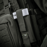M-Tac Elastisk Tourniquet Holder Gen. III i holdbart Cordura 500D materiale monteret på taktisk vest.