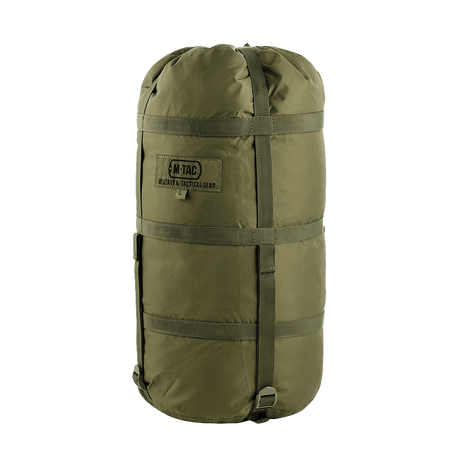 M-Tac Kompressionspose i vandafvisende nylon med stropper til pladsbesparelse, ideel til sikker opbevaring og transport af udstyr.