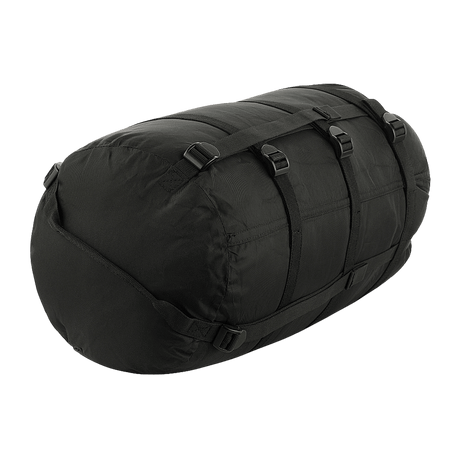 Sort M-Tac Kompressionspose i slidstærkt nylon, ideel til opbevaring og transport. Vandafvisende med kompressionsstropper til pladsbesparelse.