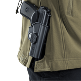 M-Tac Soft Shell Police Jakke med sidevisning af skjult pistolhylster, funktionelt design til vejrbeskyttelse og bevægelsesfrihed.