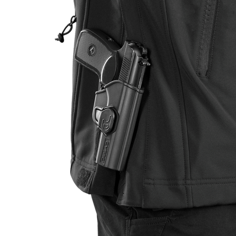 M-Tac Soft Shell Police Jakke med lukket våbenhylster til præsentation af jakkeegenskaber og alsidighed i forskellige situationer.