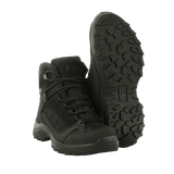 M-Tac Taktiske Sæsonstøvler i sort med skridsikre såler og åndbar overdel, ideel til taktiske opgaver og outdoor-aktiviteter.