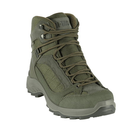 M-Tac Taktiske Sæsonstøvler i grøn med ruskind og Cordura stof, ideelt til taktiske opgaver og trekking i udfordrende terræn.