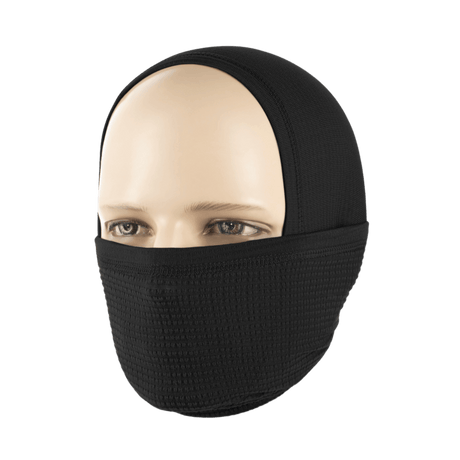 Person iført et M-Tac Tube Scarf Polartec Power Grid som en ansigtsmaske. Beskyttelse mod vind og kulde med stilfuldt design.