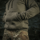 M-Tac Cotton Raglan Hard Hoodie med fleecefor, raglanærmer og kængurulomme i camouflage baggrund. Perfekt til efterår og vinter.