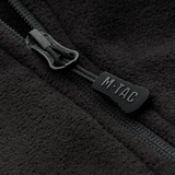 Nærbillede af M-Tac Delta Fleece Jakke lynlås, viser sort fleece stof og lynlåsdetaljer, ideel til udendørs brug i koldt vejr.