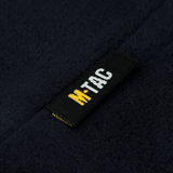 M-Tac Fleece Watch Cap Light Polartec Gen II med mærkeetiket på Polartec Micro Series fleece, vises i nærbillede for detaljer.